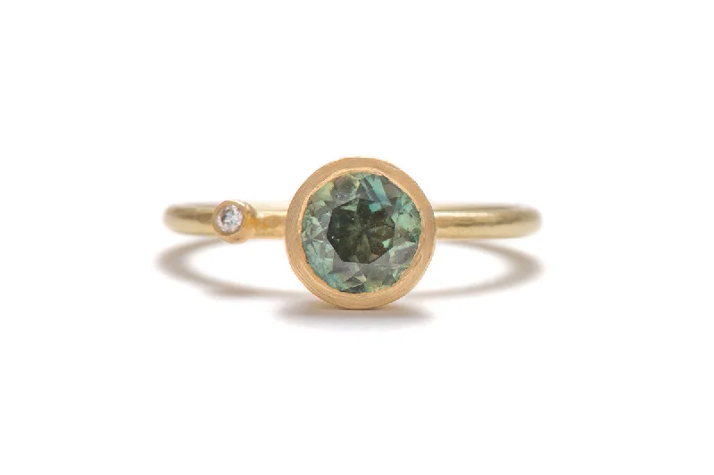 best women’s jewelry for cocktail parties -Teal Blue Australian Parti Sapphire on 18ct Yellow Gold Band with Accent Diamond