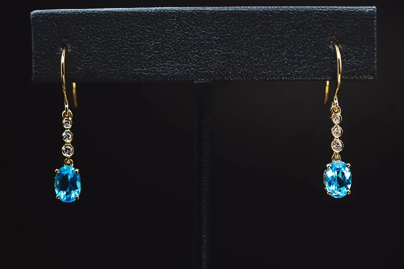 stylish women’s earrings for wedding guests -14k Yellow Gold Blue Topaz and Diamond Earrings